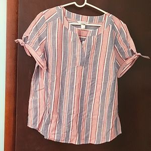 Red and blue striped top.
